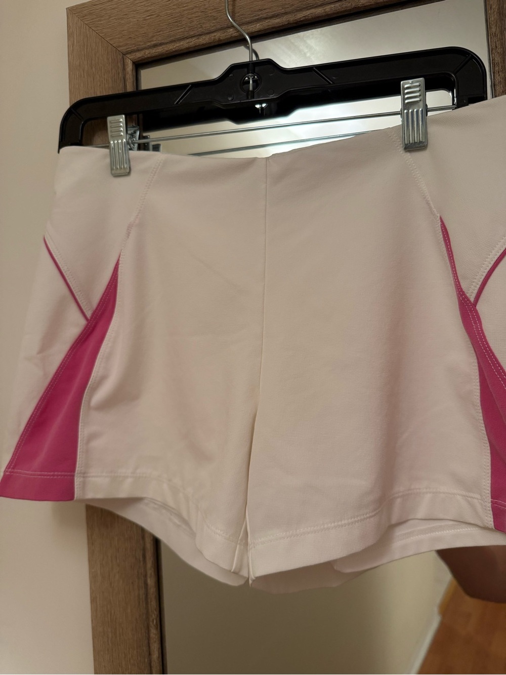 Nike White Athletic Shorts with Pink Side Panels
